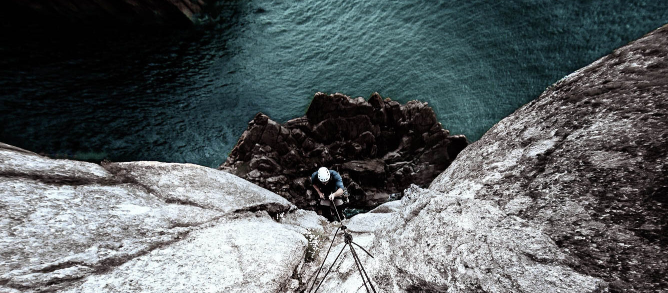 High Angle View Of Man Rock Climbing High Angle View Of Man Rock Climbing