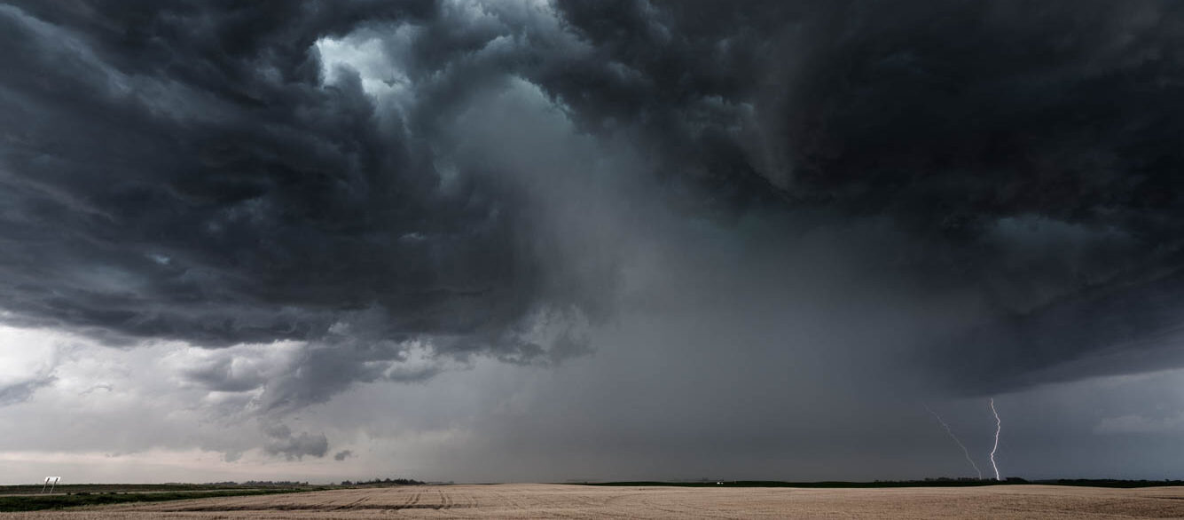 Rain and lightning in the distance over a wheat field Rain and lightning in the distance over a wheat field