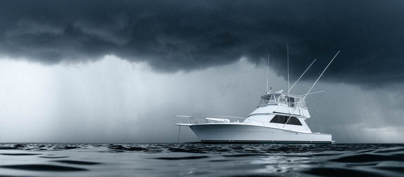 Yacht on ominous stormy ocean Yacht on ominous stormy ocean