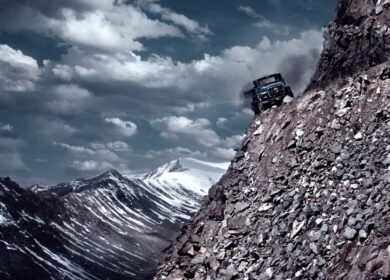 Truck dangerously close to edge of mountain road Truck dangerously close to edge of mountain road
