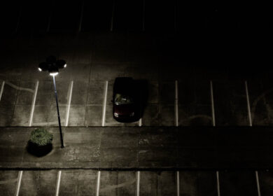 Near-empty parking lot at night