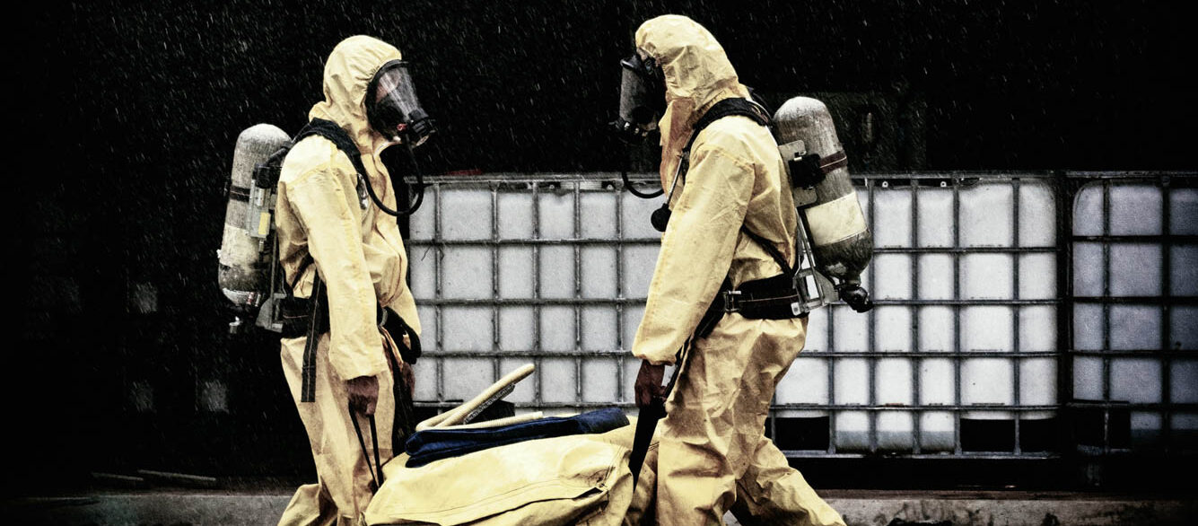 chemical spill pollution response team in action recovery stop spill of the chemical spill pollution at factory . Hazard emergency response concept Chemical spill pollution response team in action recovery stop spill of the chemical spill pollution at factory