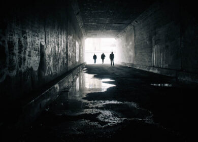 Silhouettes of three people in Sixth Street Tunnel, Los angeles, California, America, USA